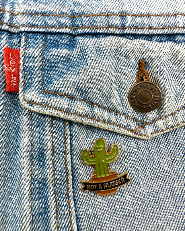 Not a Hugger Pin Badge | Tags: Accessories