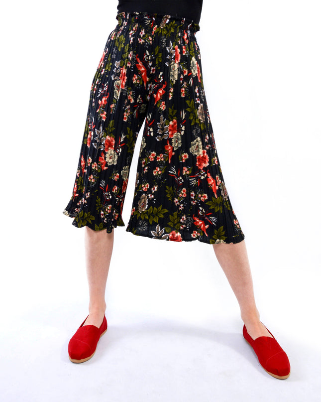 Kukka-kuosiset laskostetut housut