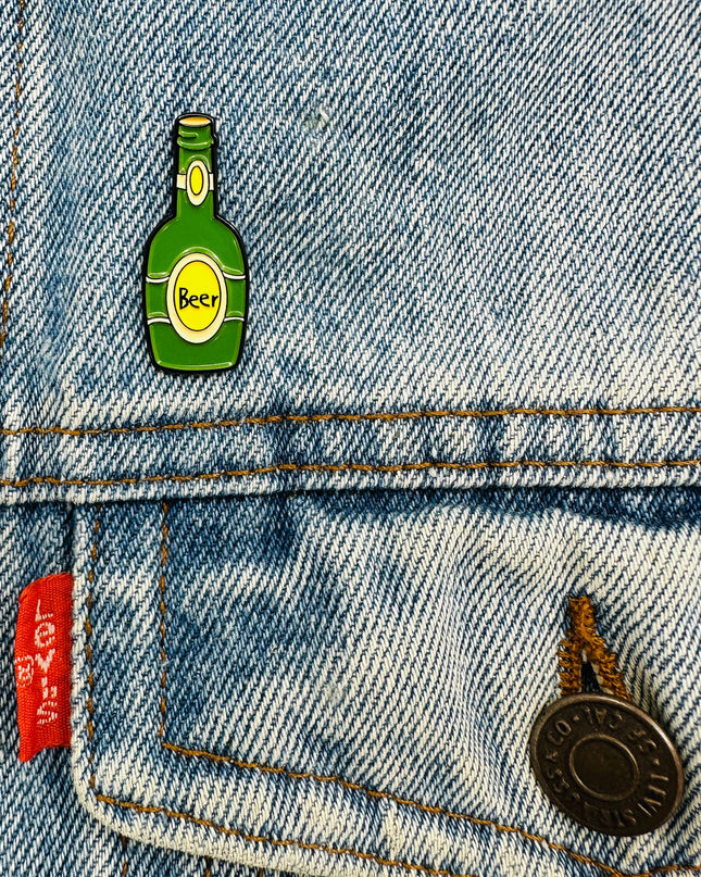 Olut-tarvikkeiden pinssi