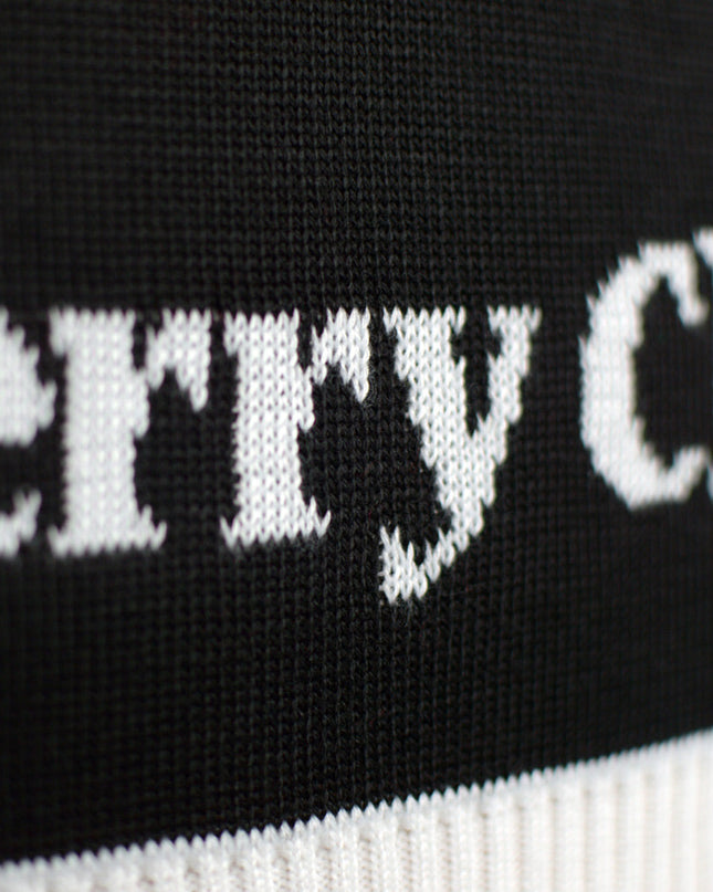 Lasten joulupusero musta joulukuusikuvioinnilla