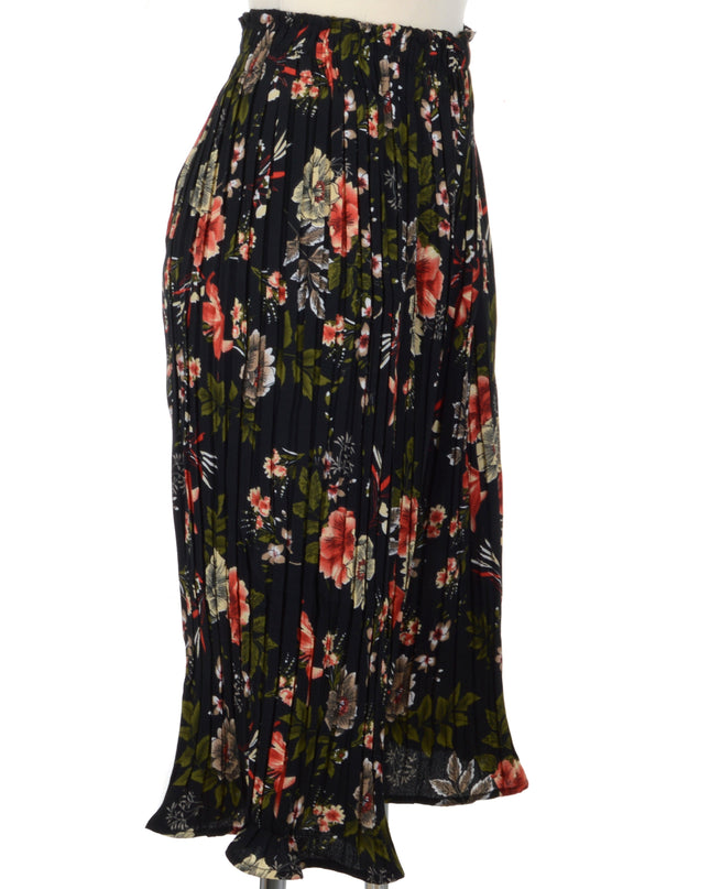 Kukka-kuosiset laskostetut housut